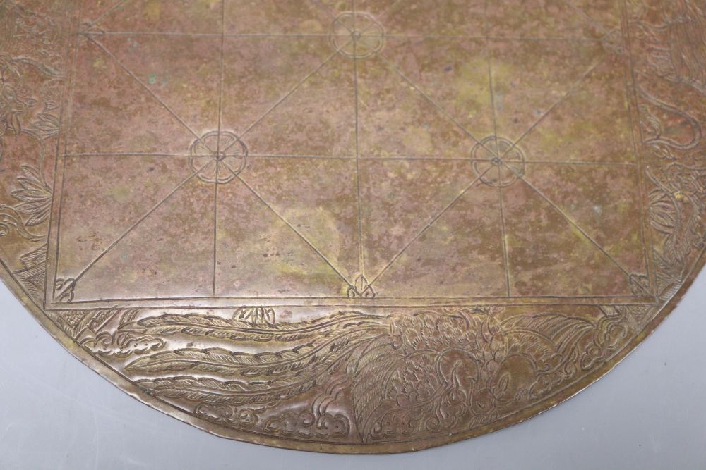 A Chinese 19th century brass games board, diameter 24cm